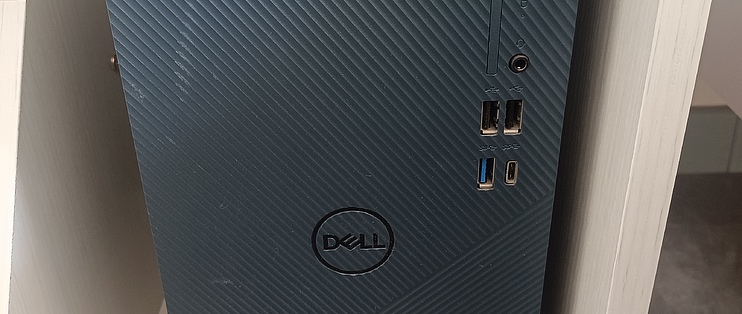 戴尔台式主机怎么放光盘的